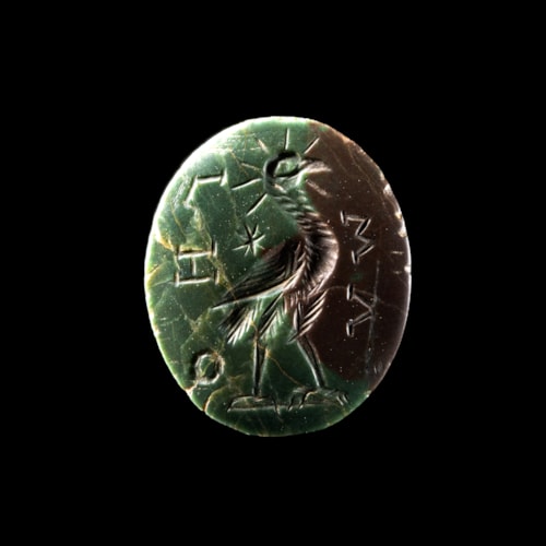 *A Roman gnostic green and brown jasper intaglio. Phoenix.